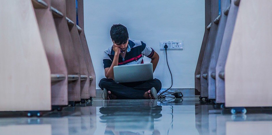 Student Sitting in Libary